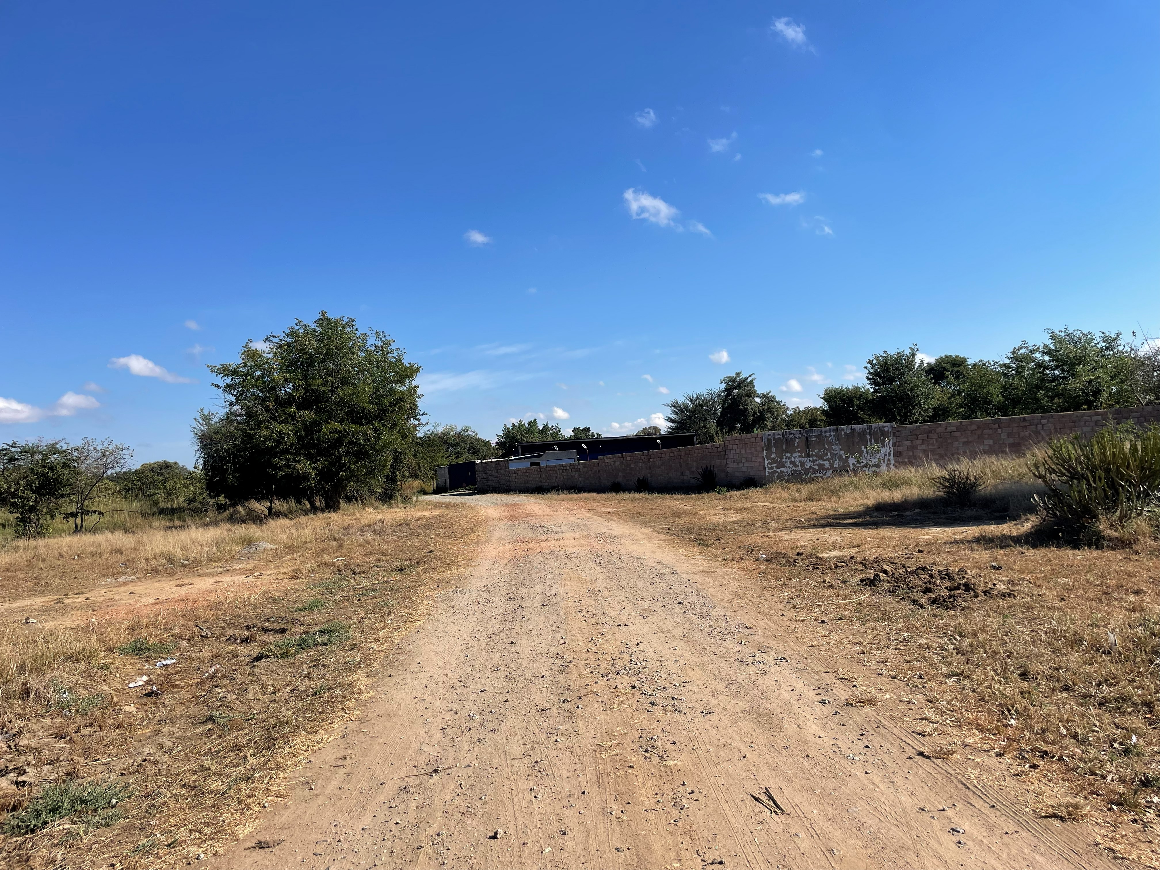 The access road to the compound by day